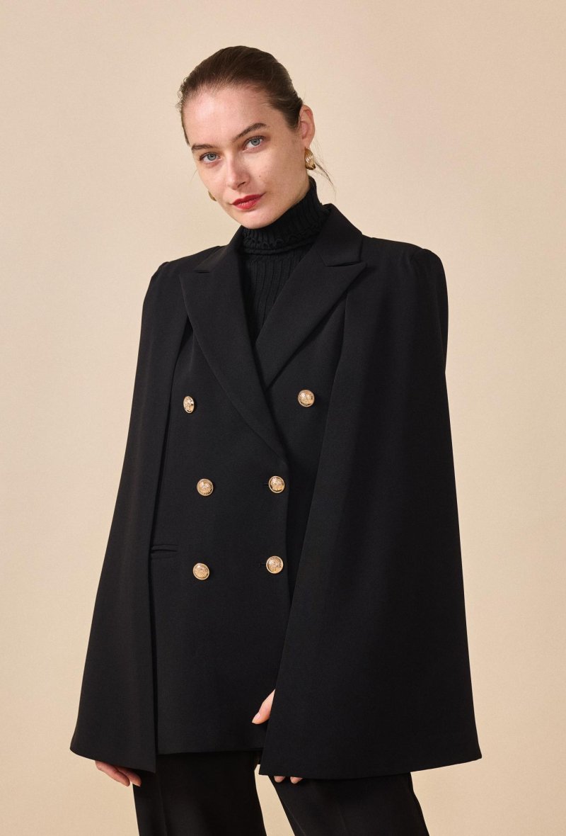 Veste cape courte avec boutons dorés
